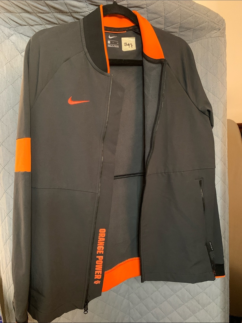 Nike Men’s Charcoal Jacket with Bright Orange Accents